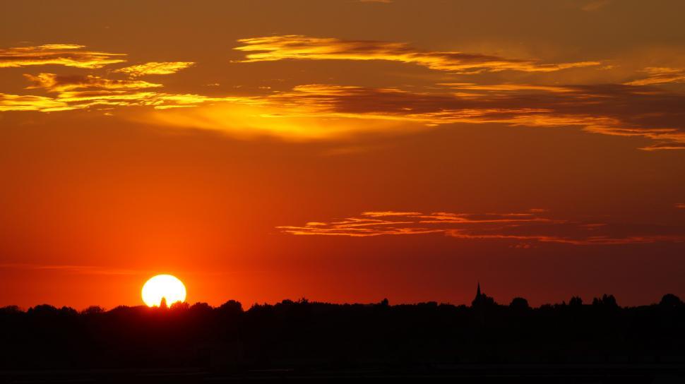 Free Image of Sunset with vibrant sky and silhouette 