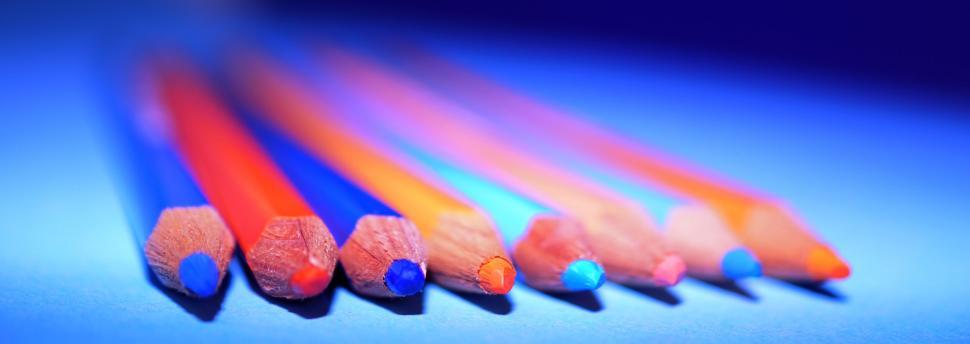 Free Image of Colorful pencils on a blue background 