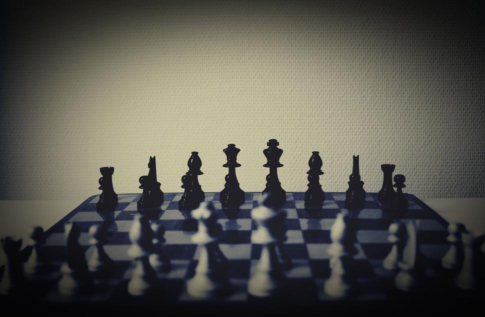 Free Image of Chessboard with pieces lined for a game 