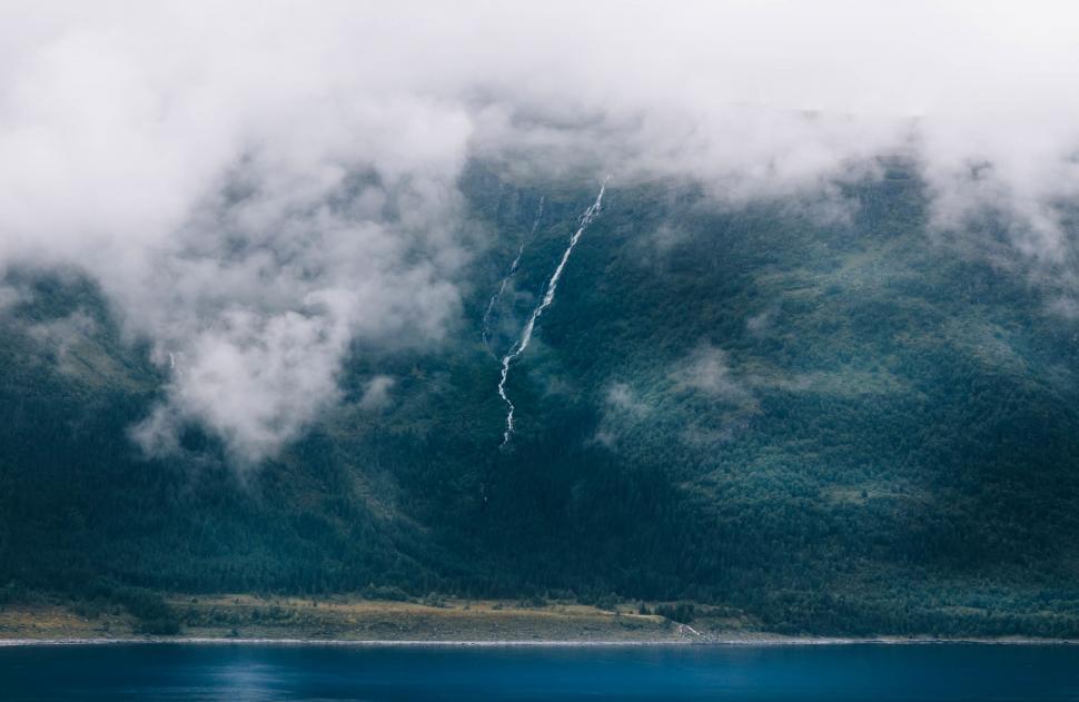 Free Image of Mountain landscape with mist and waterfall 