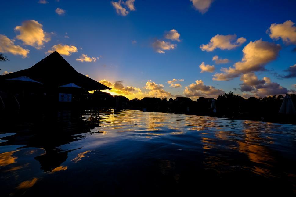 Free Image of Tropical sunset with reflection pool 