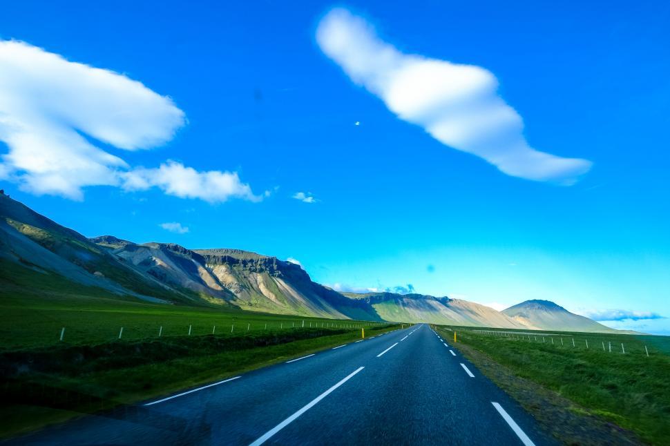 Free Image of Open road through mountainous landscape 