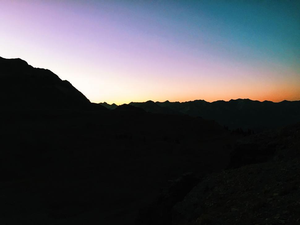 Free Image of Colorful twilight over mountain silhouette 