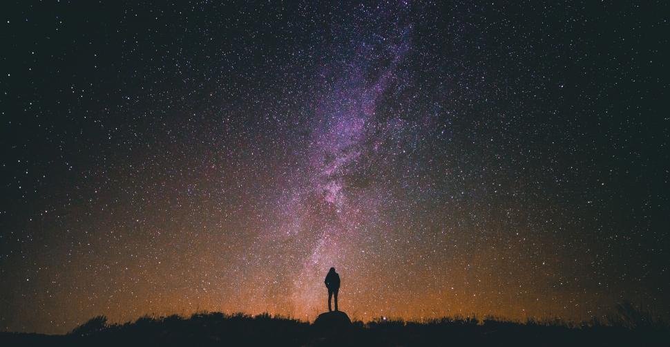 Free Image of Silhouette against a star-studded sky 