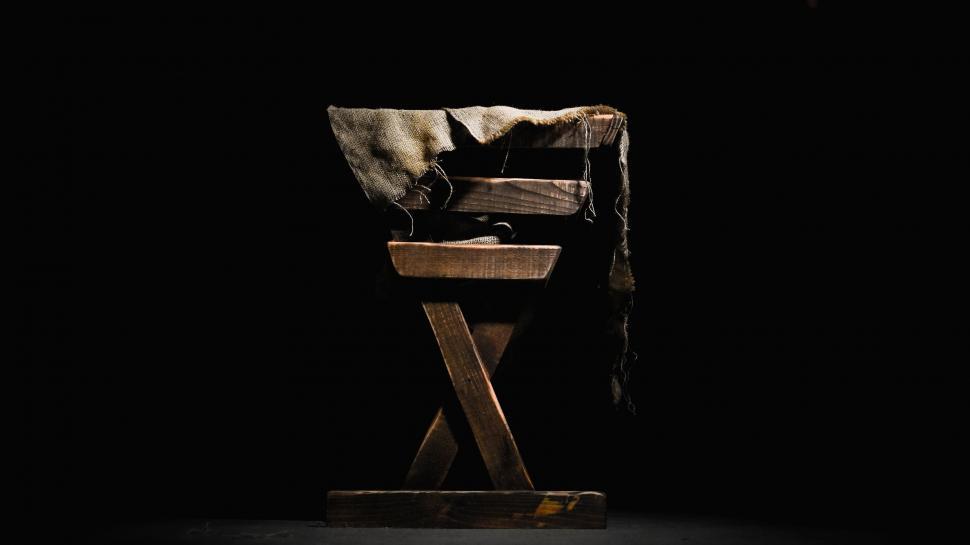Free Image of Antique wooden stool with draped burlap 