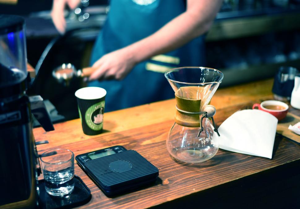 Free Image of Barista prepares pour-over coffee 