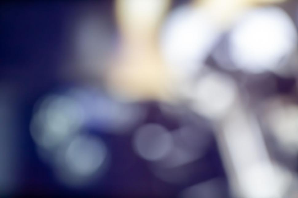 Free Image of Abstract blurred bokeh light background in blue tones 