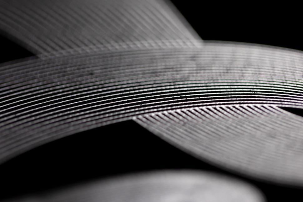 Free Image of Monochrome patterned lines on black 