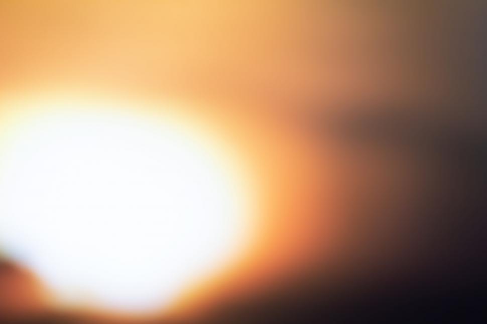 Free Image of Warm orange and yellow bokeh lights 