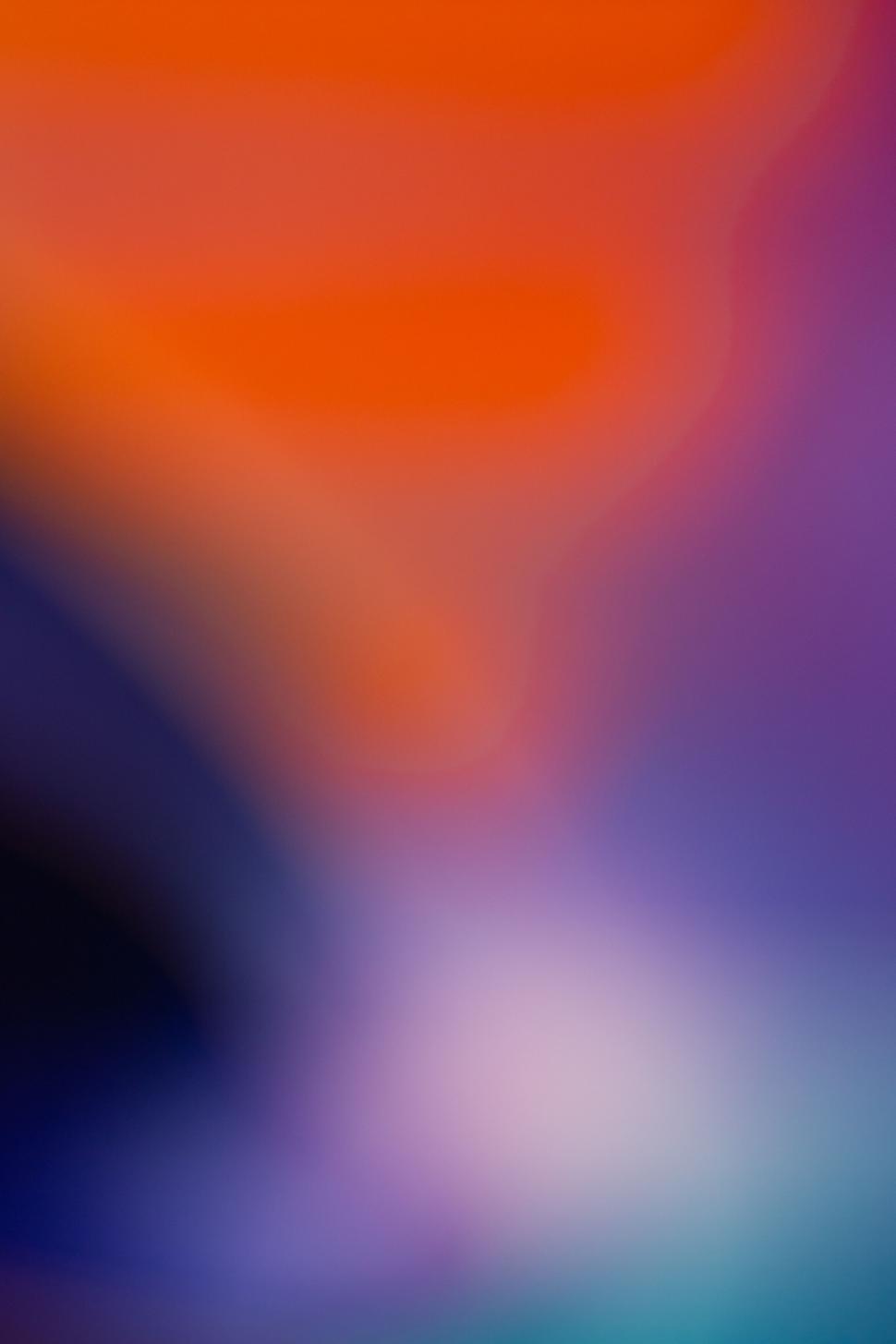 Free Image of Vibrant Orange and Purple Blur Effect 