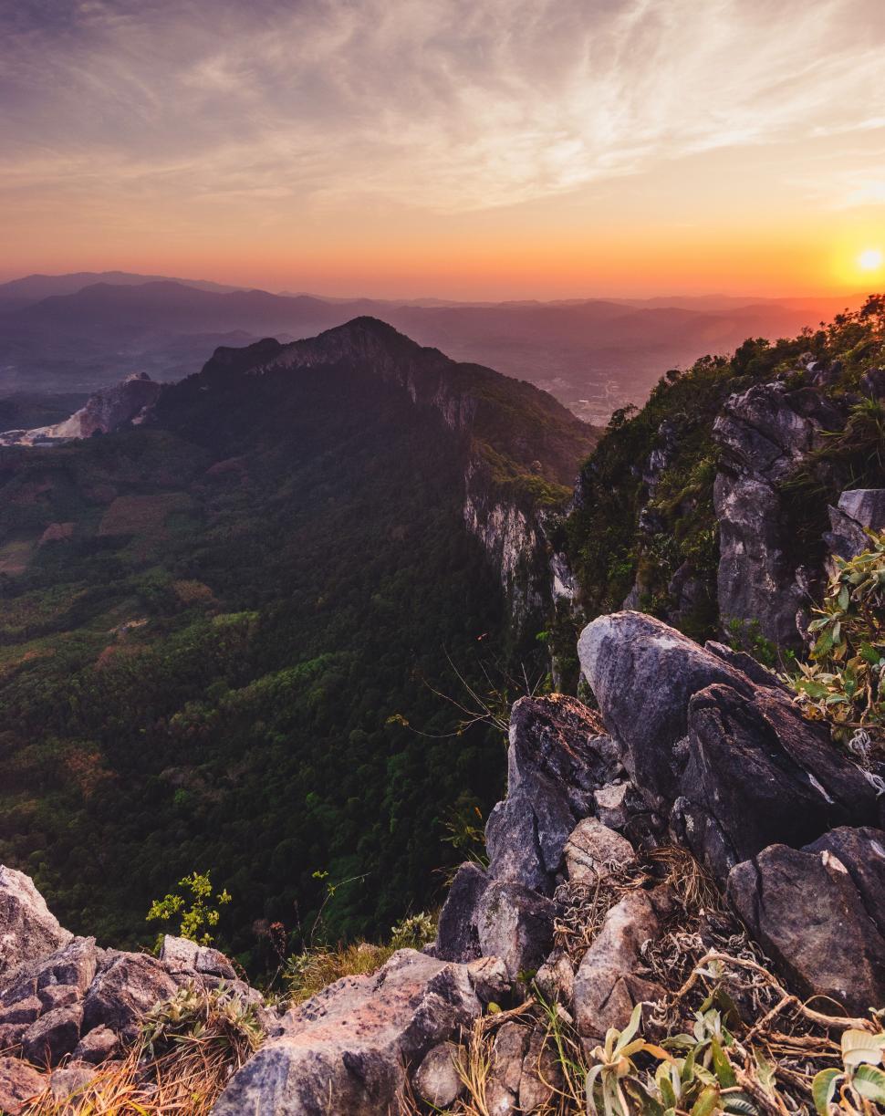 Free Image of Mountain landscape at sunset with rocks 