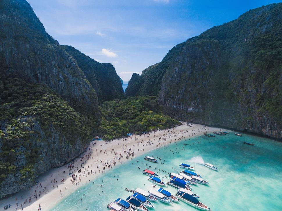 Free Image of Aerial view of a busy tropical beach 