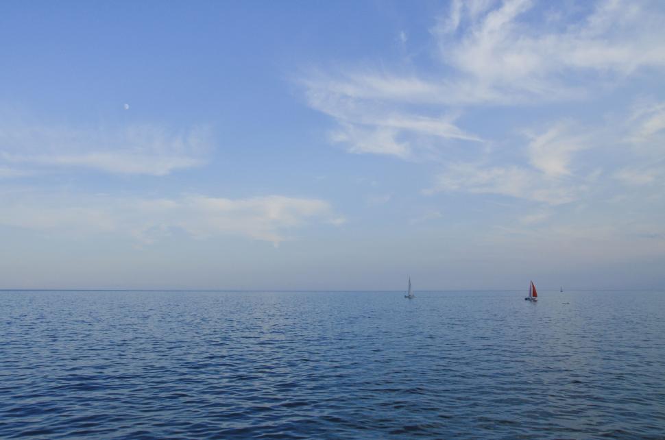 Free Image of Sailboats on the calm blue sea 