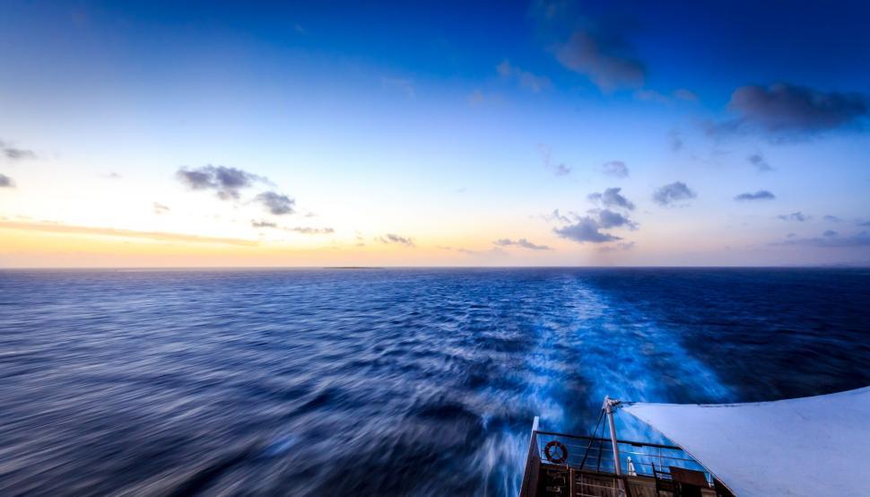 Free Image of Ship s stern view at sea during sunset 