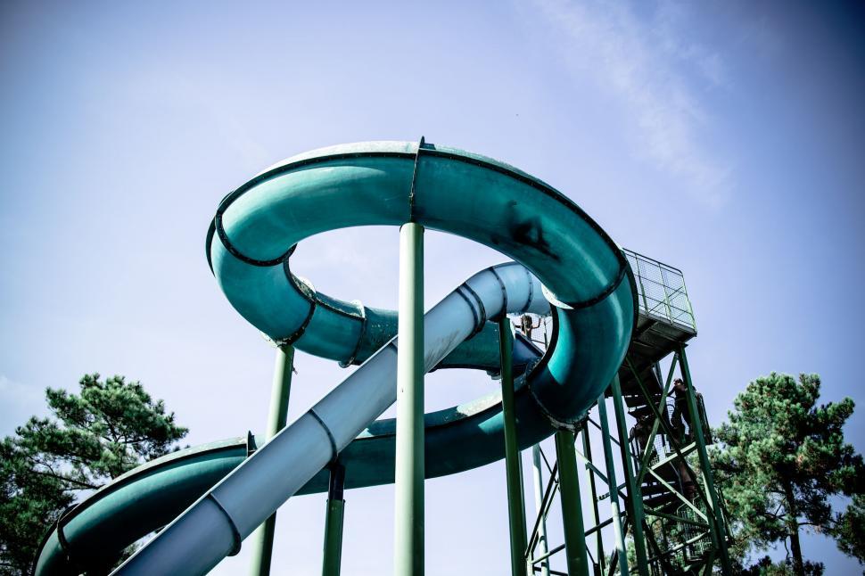 Free Image of Water slide towering against the sky 