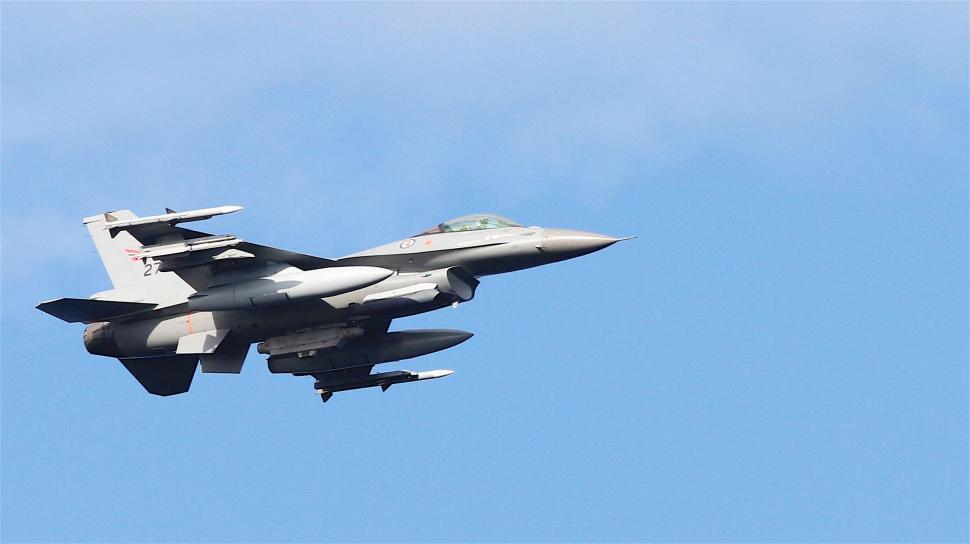Free Image of Modern fighter jet soaring in the sky 