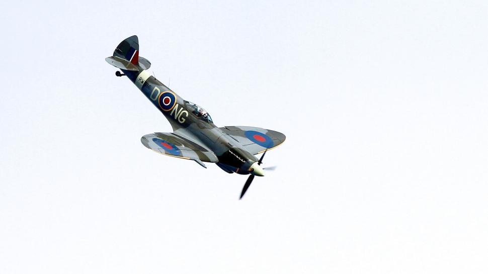Free Image of Vintage World War II aircraft in flight 