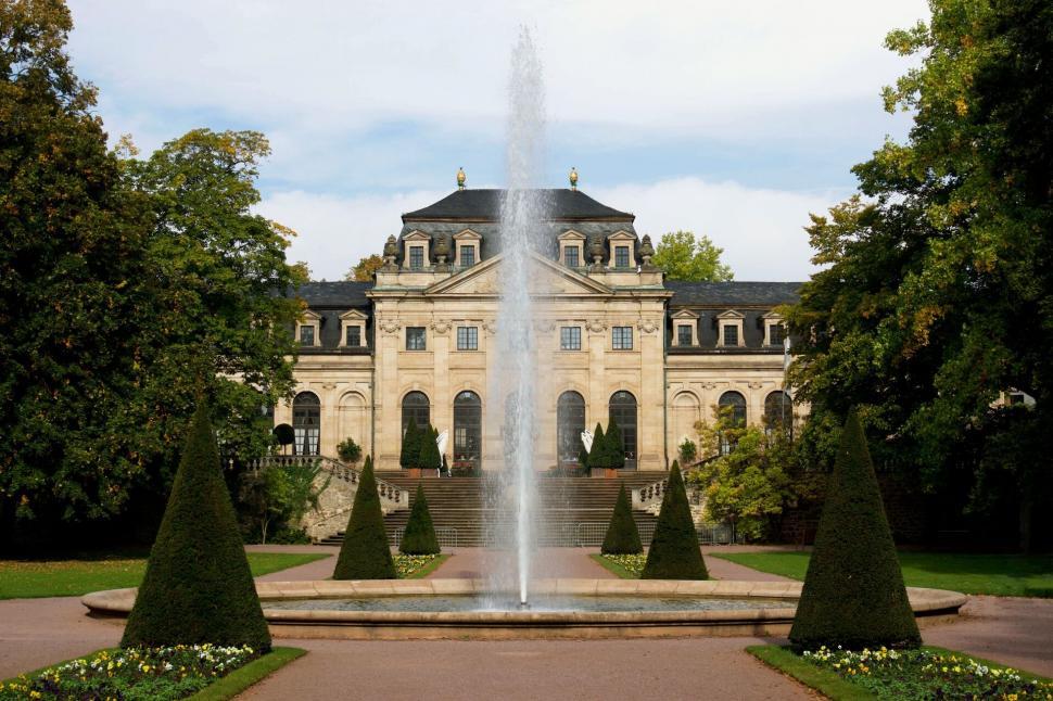 Free Image of Grand historic building with a fountain 
