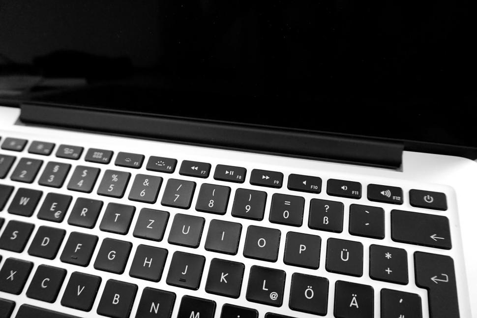 Free Image of Laptop keyboard and black screen closeup 
