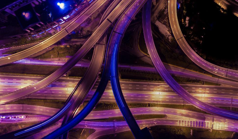 Free Image of Illuminated highway interchange at night 