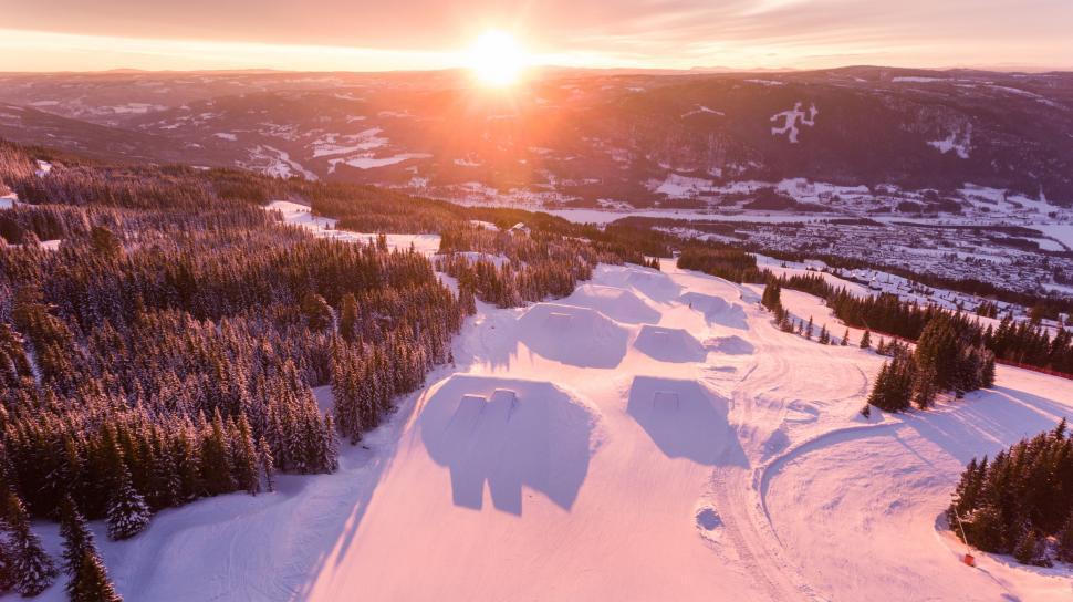 Free Image of Sunrise over a winter mountain landscape 
