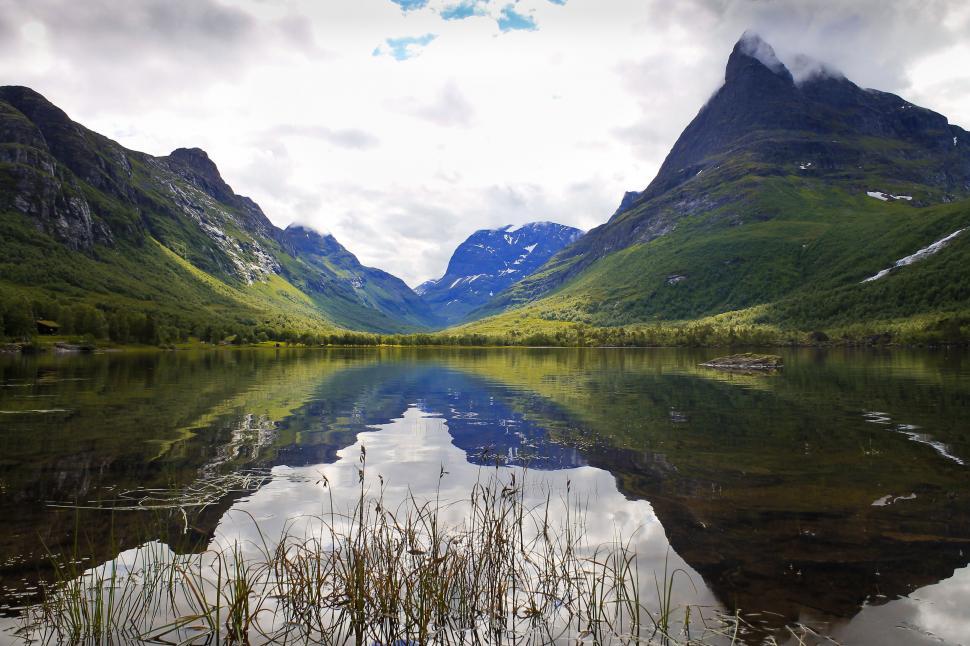 Free Image of Mountain valley with reflective lake 