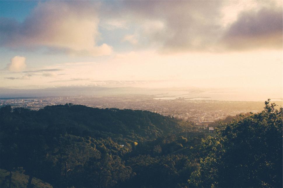 Free Image of City view over layered hills 