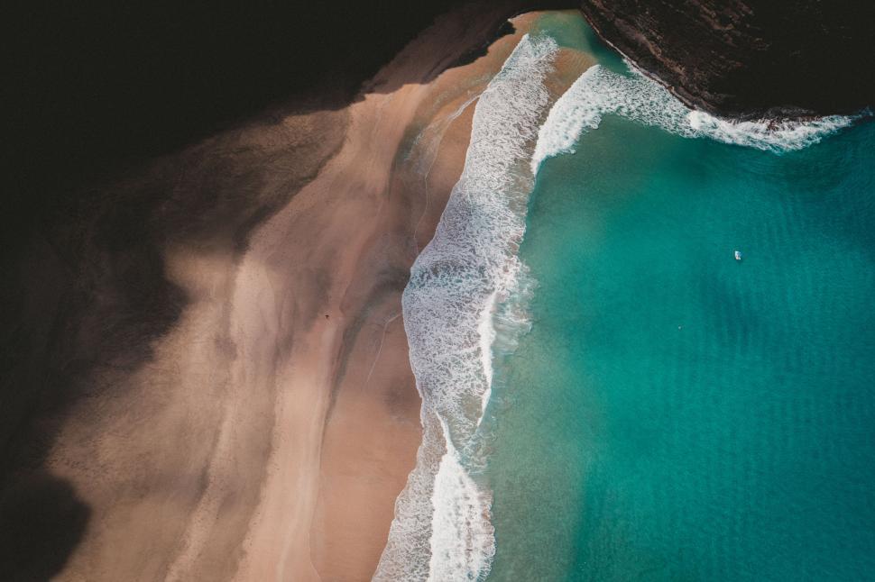 Free Image of Aerial beach view with waves and shoreline 