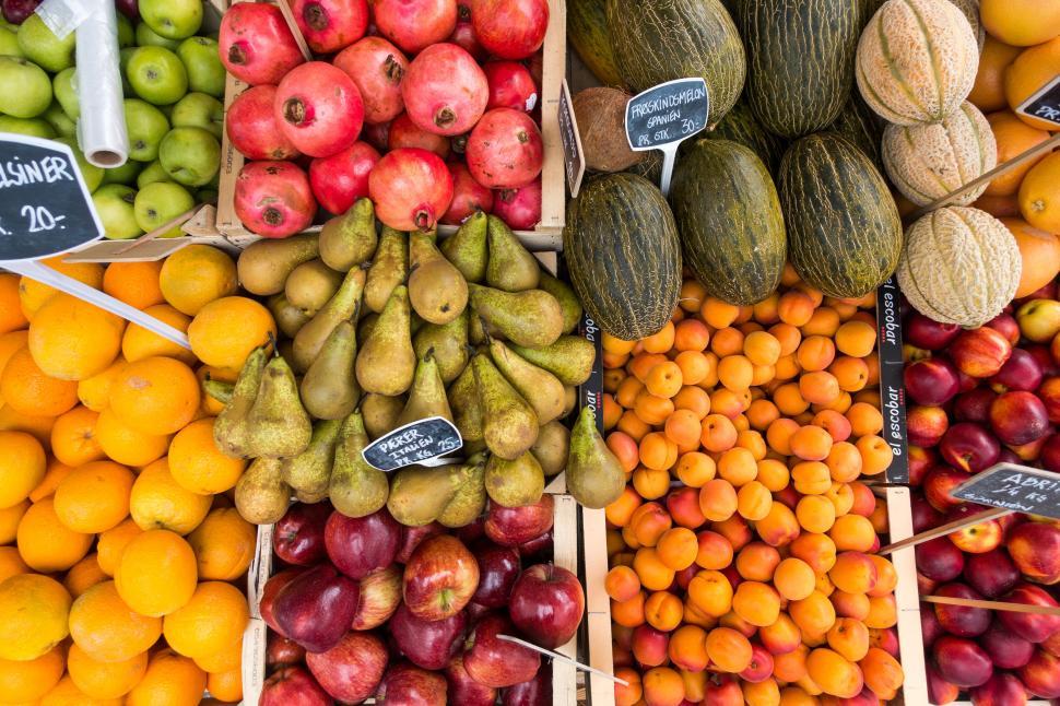 Free Image of Colorful fruit market display from above 