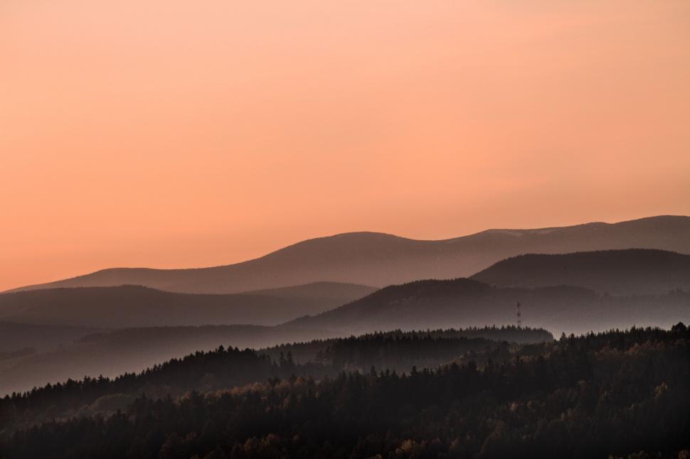 Free Image of Twilight landscape with rolling hills 