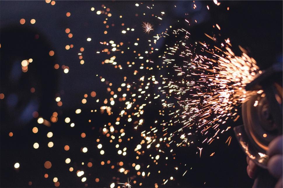 Free Image of Sparks flying from metal grinding 