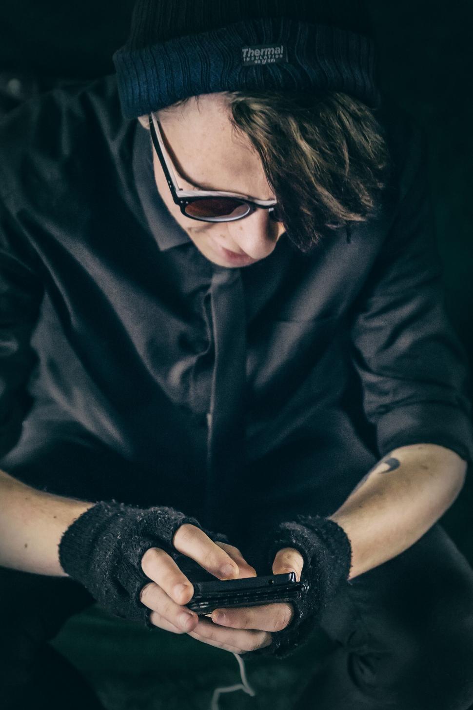 Free Image of Person using smartphone in the night 