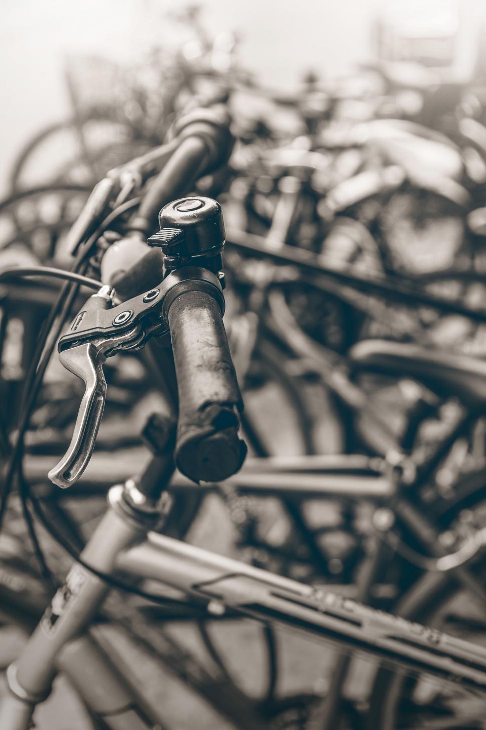Free Image of Tangled bicycles parked together 