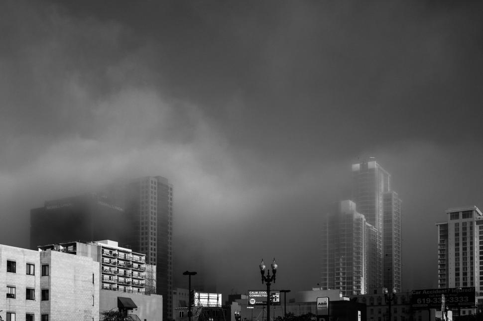 Free Image of Urban skyline obscured by fog 