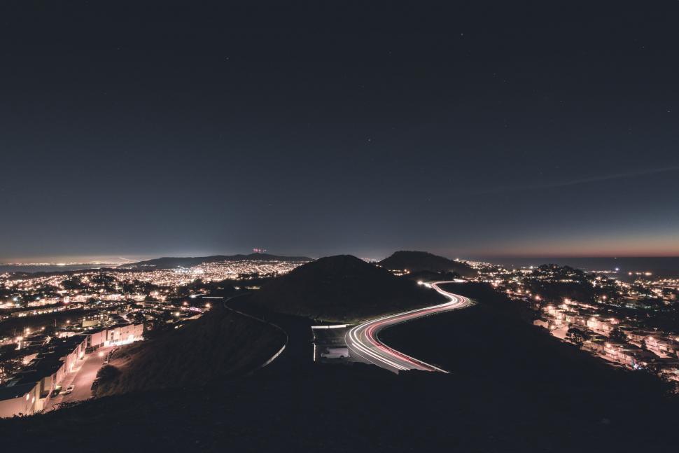 Free Image of Nighttime city view with light trails 