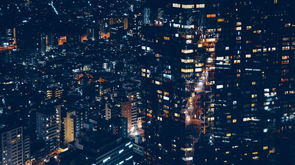 Free Image of Urban nightscape with illuminated buildings 
