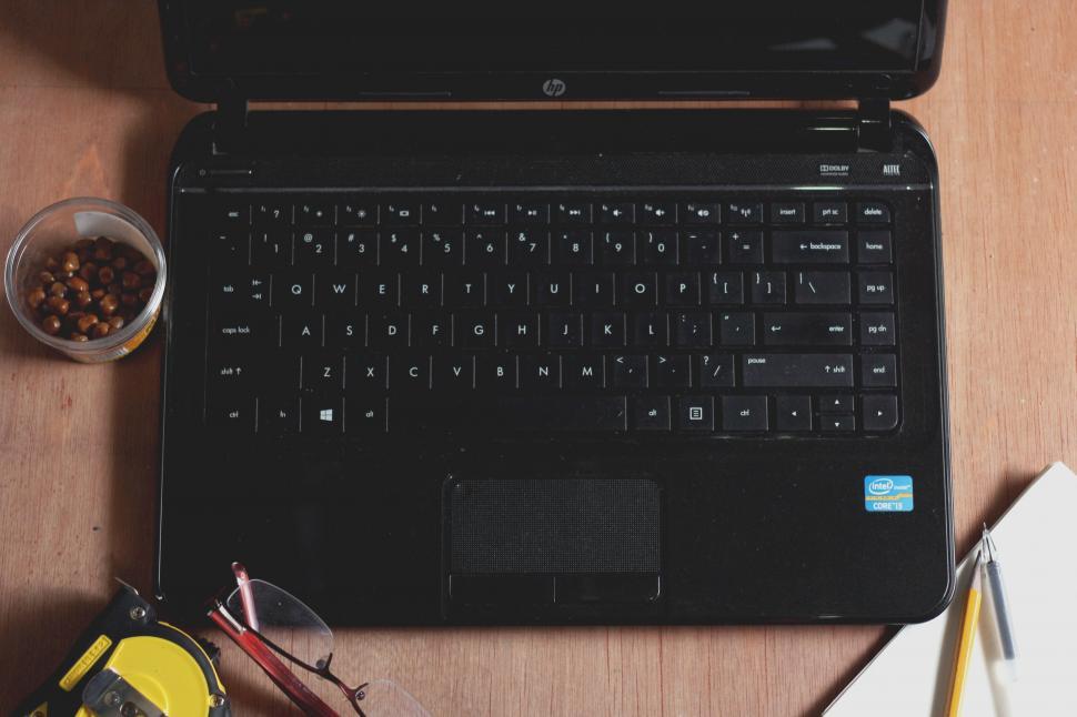 Free Image of Workstation with laptop and various objects 