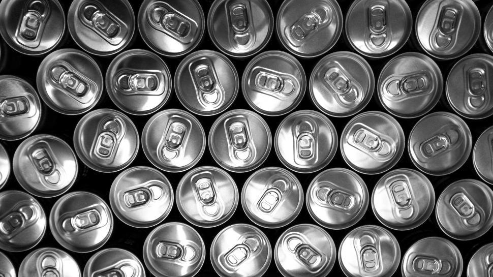 Free Image of Monochrome pattern of soda can tops 