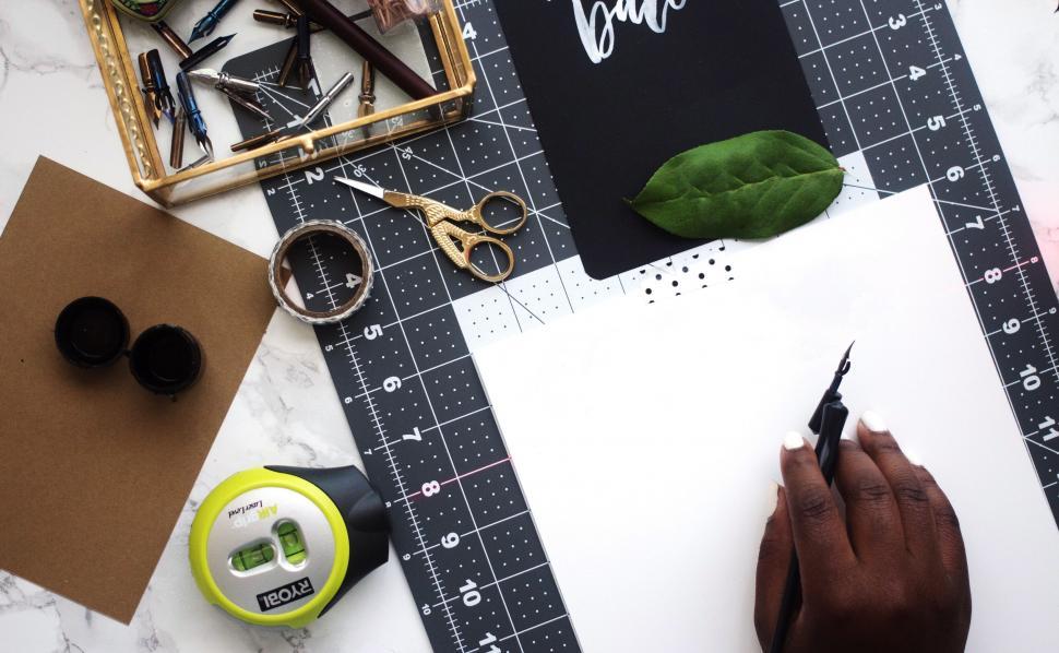 Free Image of Creative desk with calligraphy tools 