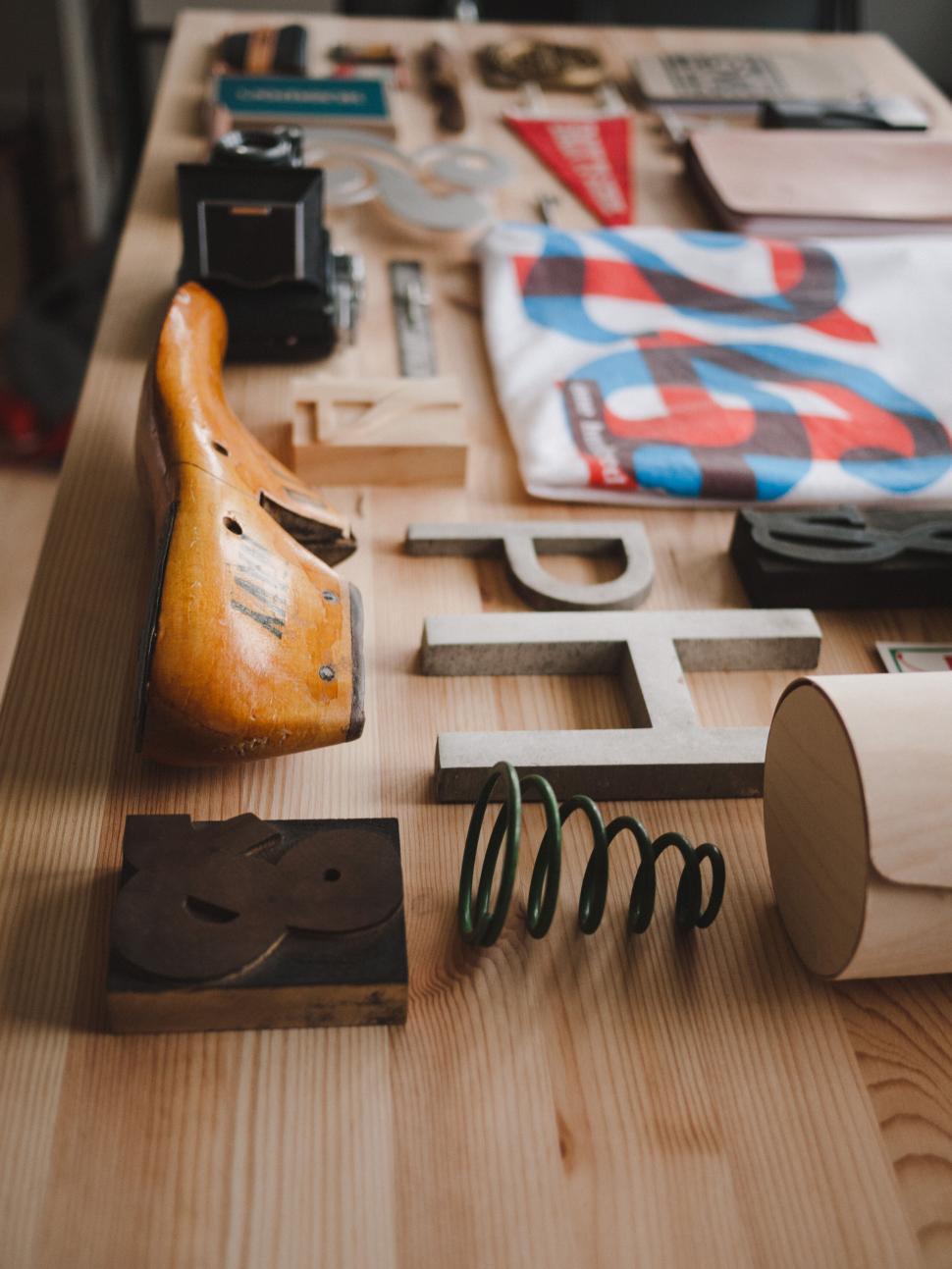 Free Image of Creative workshop with photography and woodwork tools 
