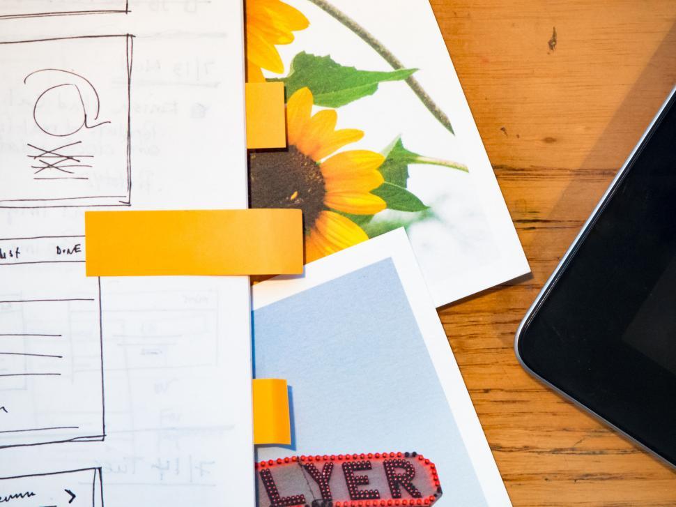 Free Image of Creative workspace with sunflower design 