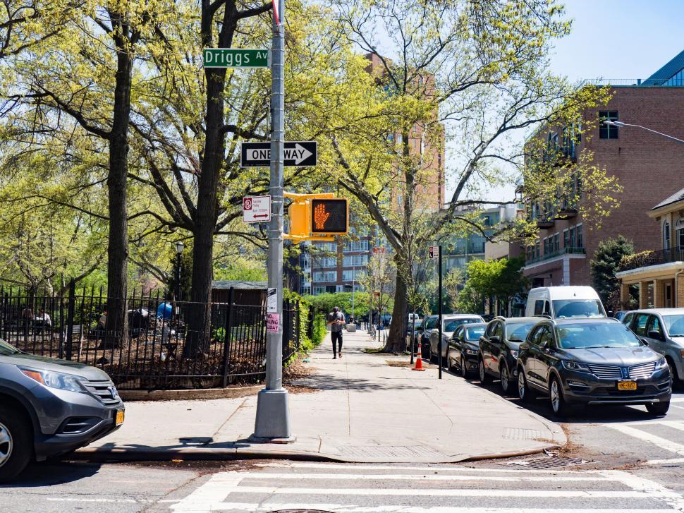 Free Image of Sunny city street with traffic signs 