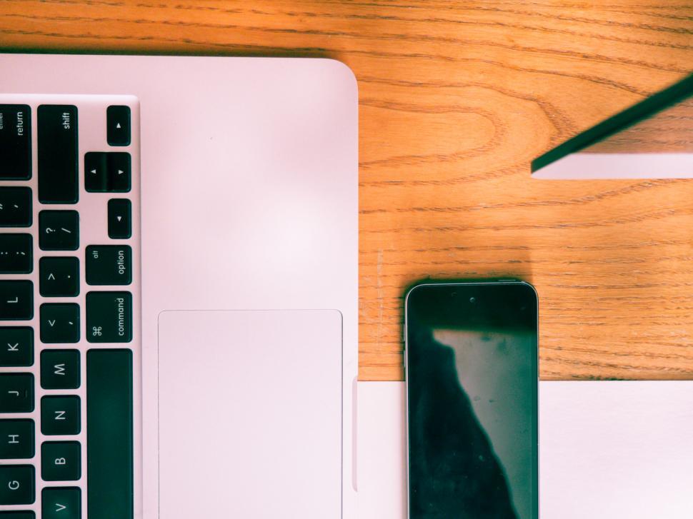 Free Image of Modern gadgets on a wooden desk 