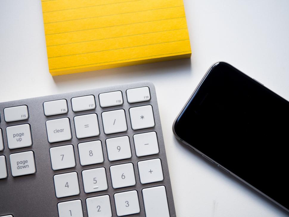 Free Image of Modern workspace with keyboard and phone 