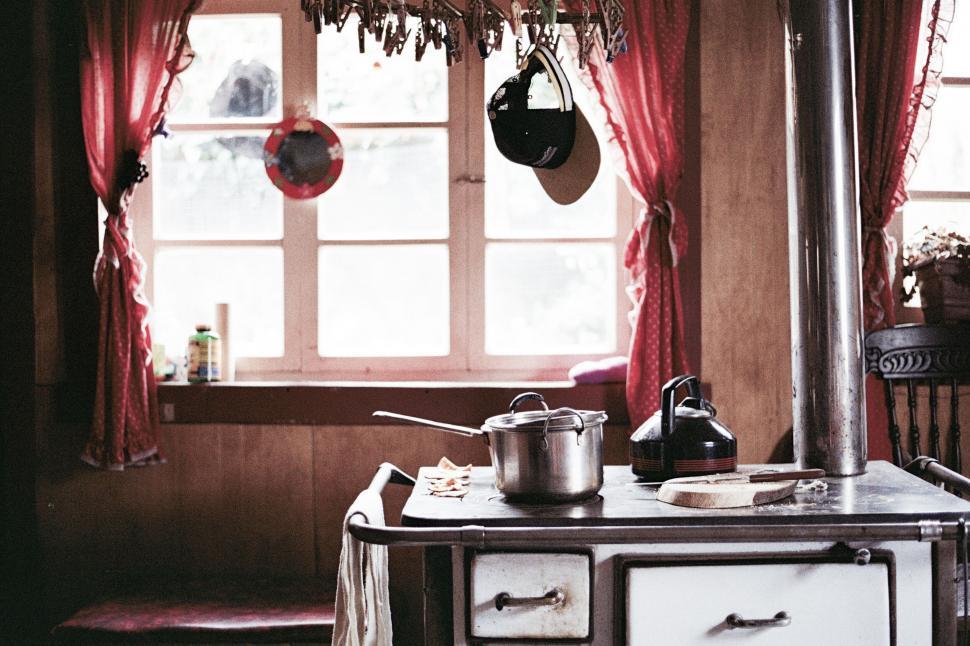 Free Image of Vintage kitchen interior with red accents 