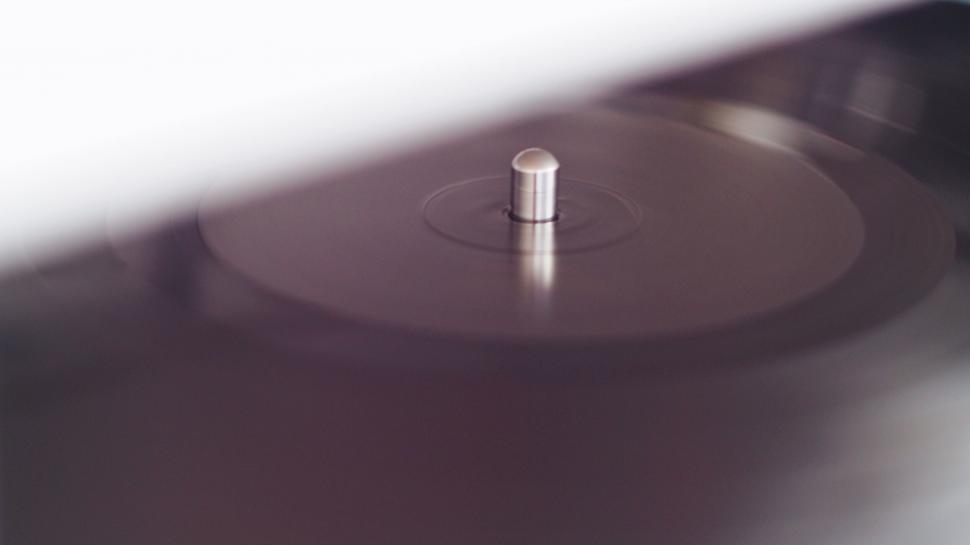 Free Image of Vinyl record spinning on a turntable 
