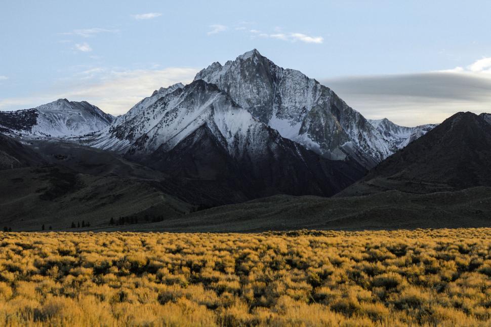 Free Image of Snowy mountain peak at sunset 