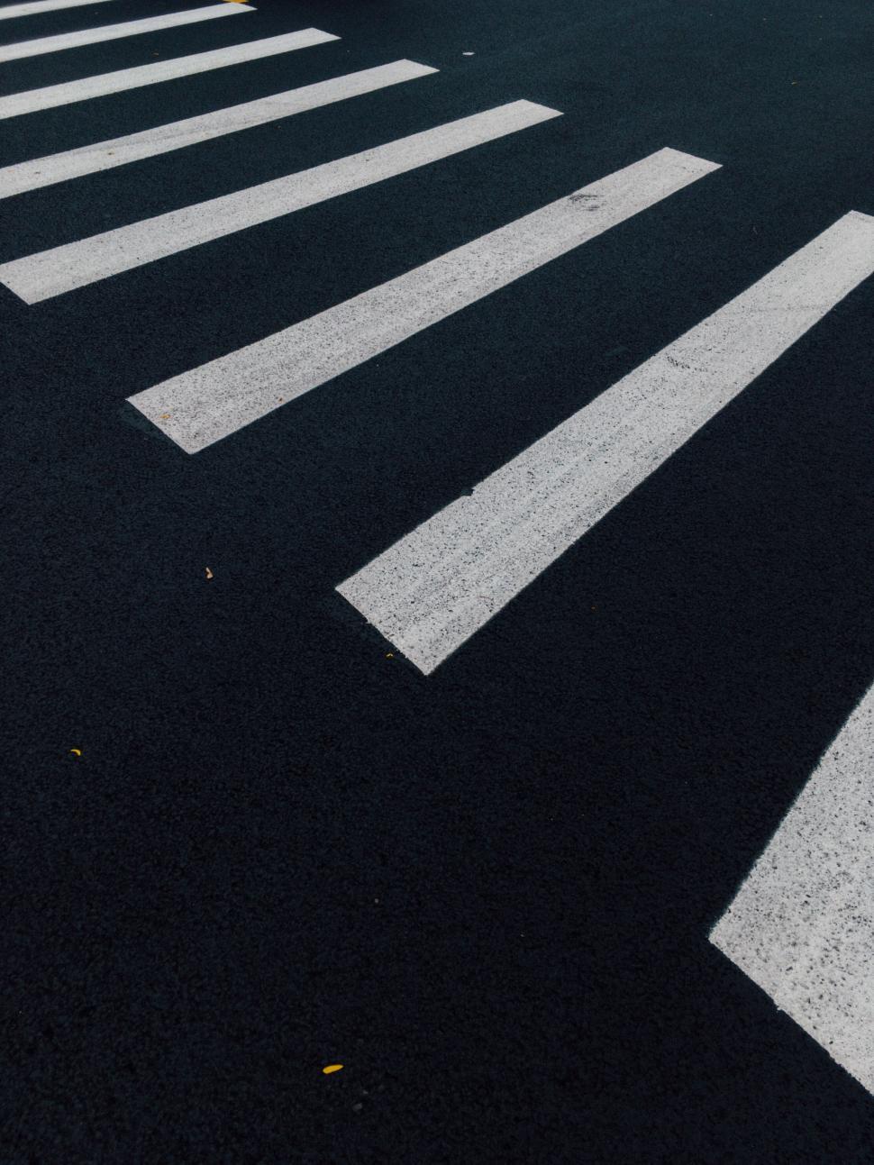 Free Image of Pedestrian crossing on an empty street 