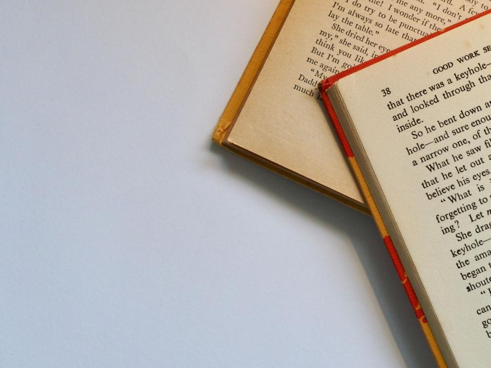 Free Image of Open vintage book with text detail 