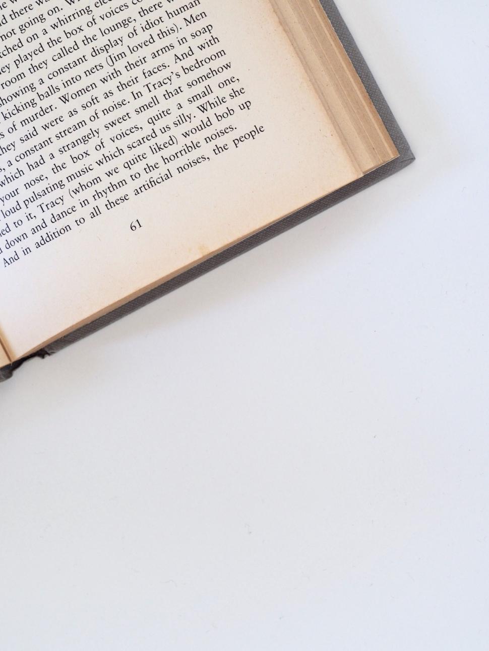 Free Image of Open book with visible text 